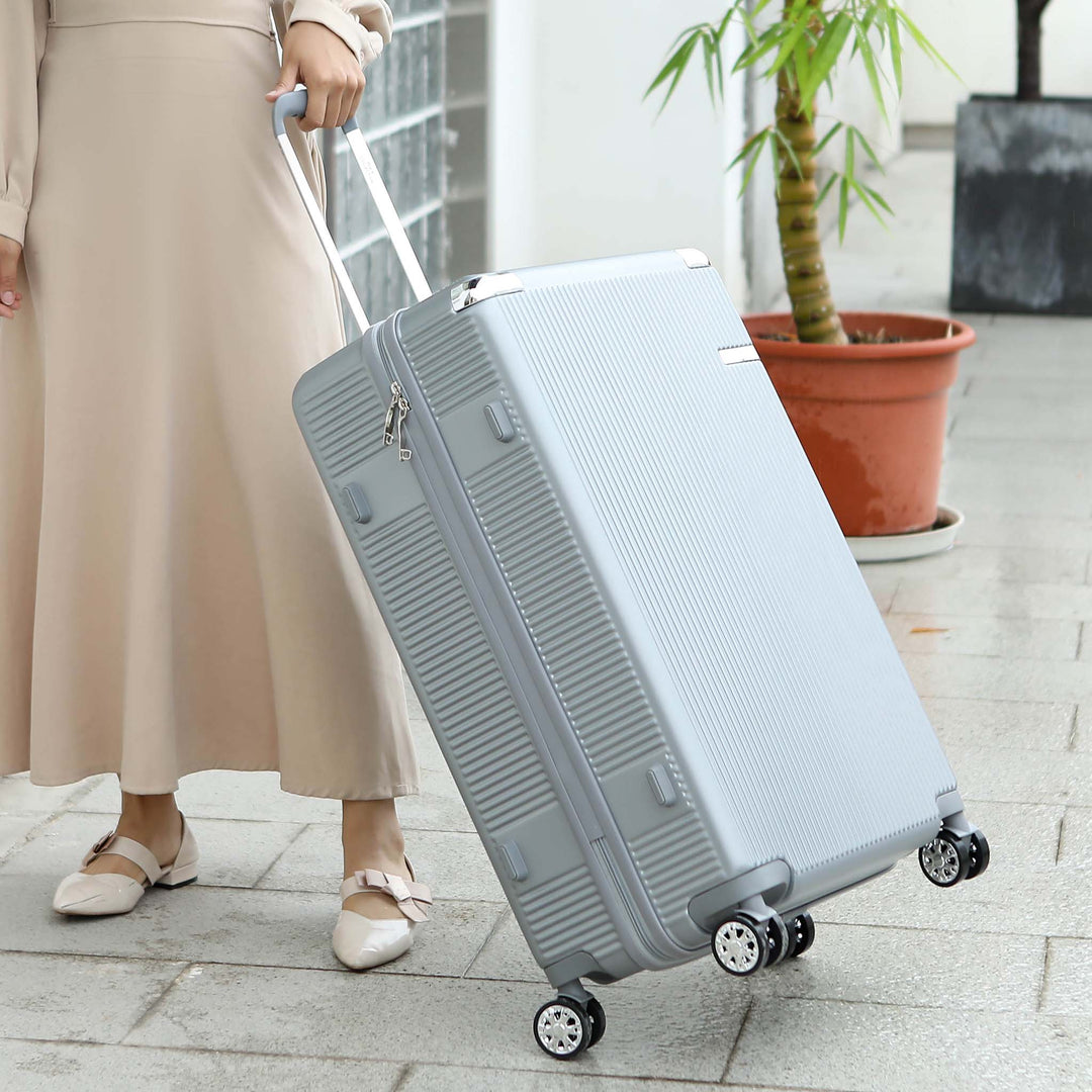 Metallic Rose Gold MKF Collection By Mia K Tulum Extra Large Spinner Luggage