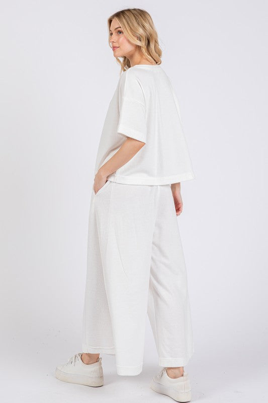 White Ces Femme Half Button Half Sleeve Top And Pants Set