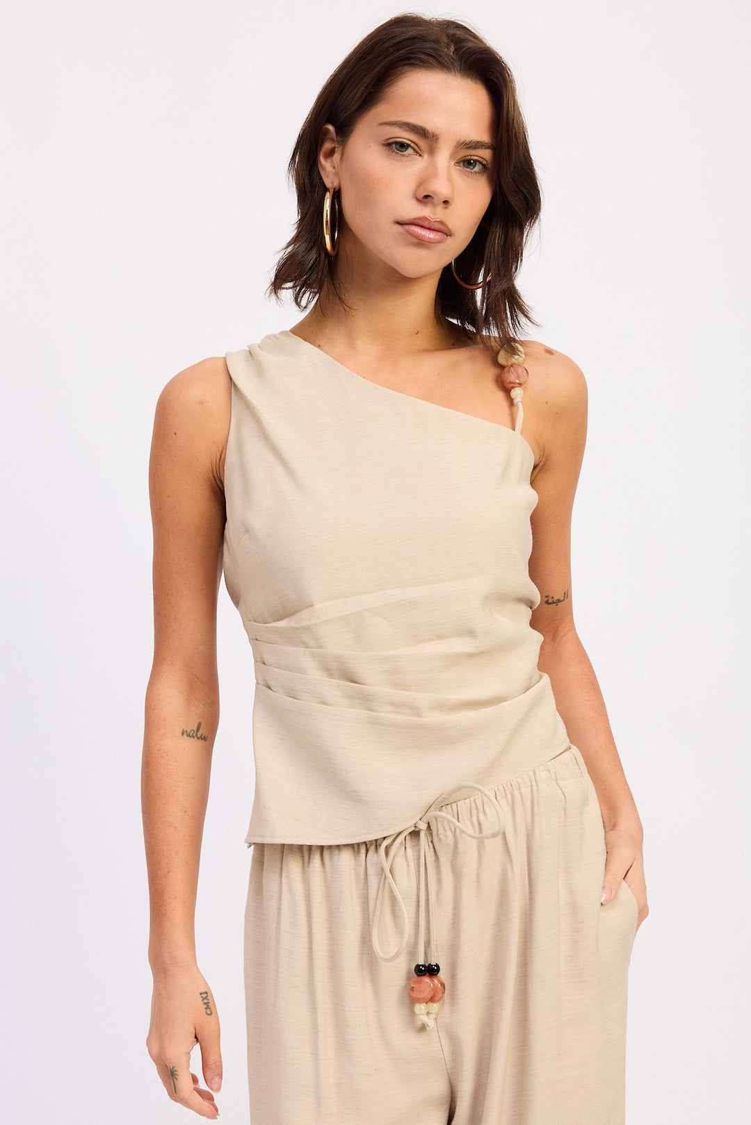 White Asymmetrical Sleeveless Top
