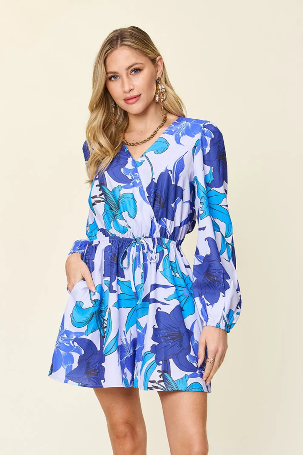Blue Double Take Full Size Floral Long Sleeve Romper With Pockets