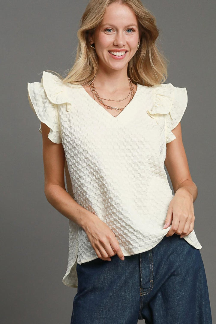Cream Umgee Full Size Textured Jacquard V Neck Ruffle Cap Sleeve Blouse Plus Size