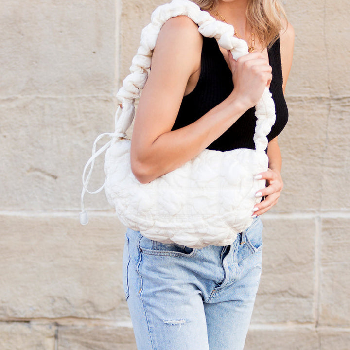 Ivory Indy Convertible Quilted Puffer Crossbody 1