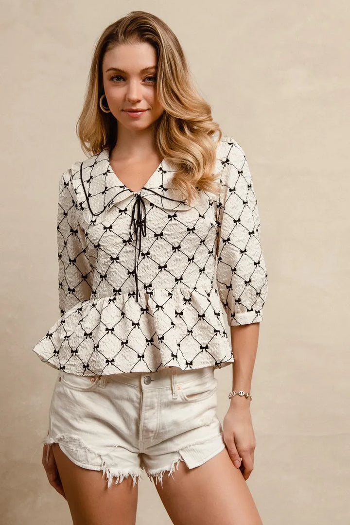Ivory Bibi Bow Prints Patterns Ruffle Collar Details Peplum Top