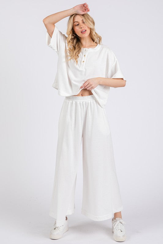White Ces Femme Half Button Half Sleeve Top And Pants Set