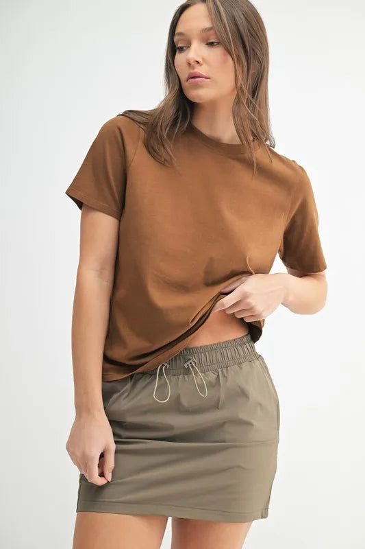 Cocoa Dust Mono B Round Neck Short Sleeve T Shirt 1